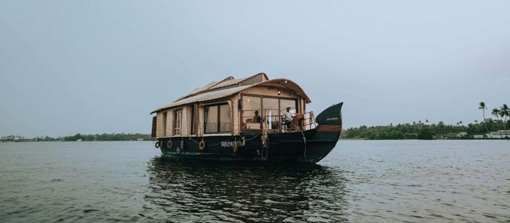 Scenic houseboat cruise across peaceful Kerala backwaters
