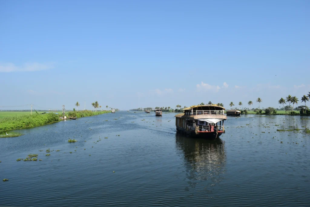 Houseboat sailing through scenic Alleppey canals