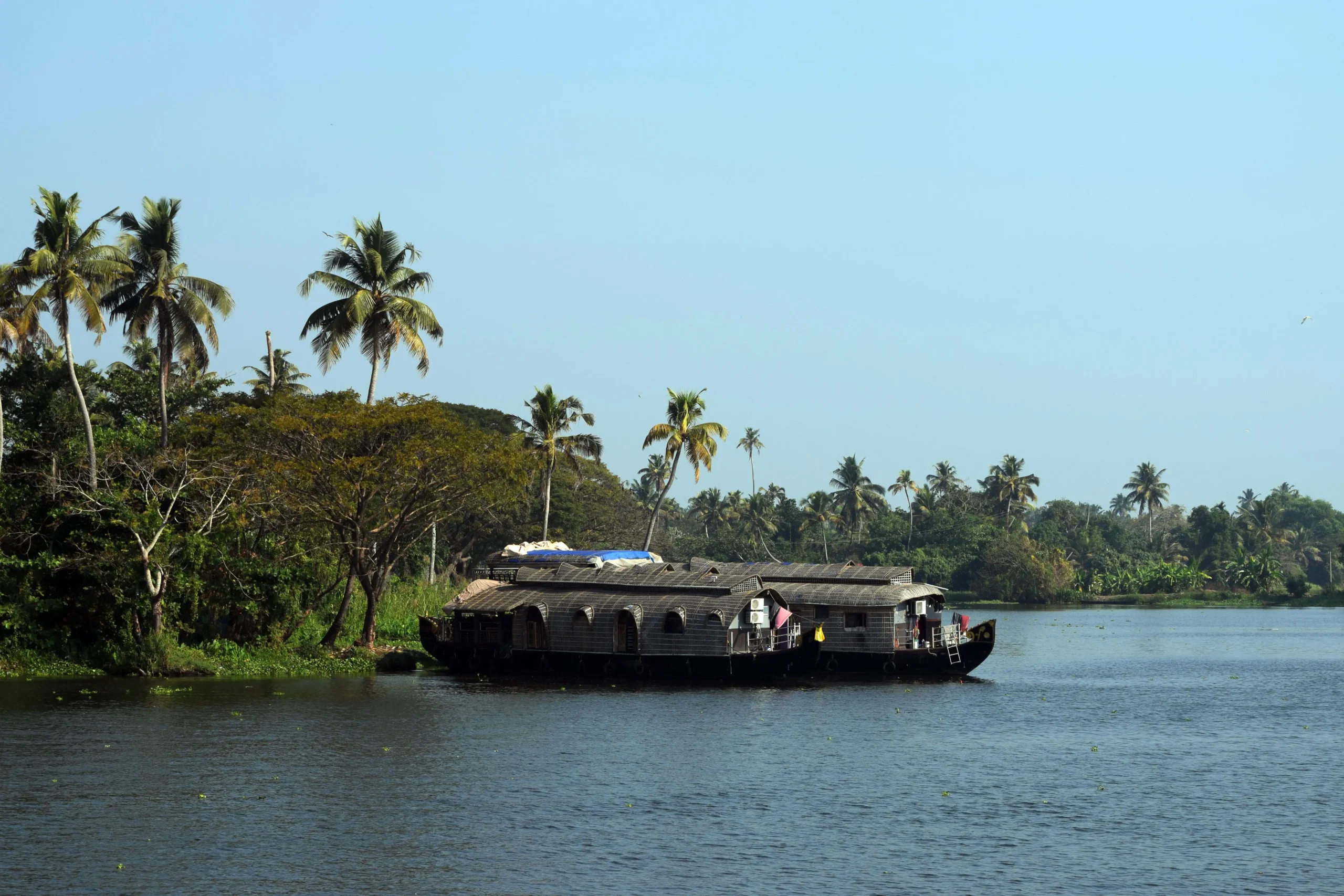 2 housboats in alleppey halted for sunset